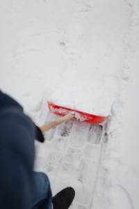 person shoveling snow